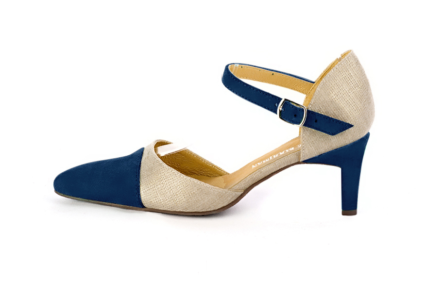 Women's navy blue and gold open side dress shoes, with an instep strap. Tapered toe. Medium comma heels - Profile view